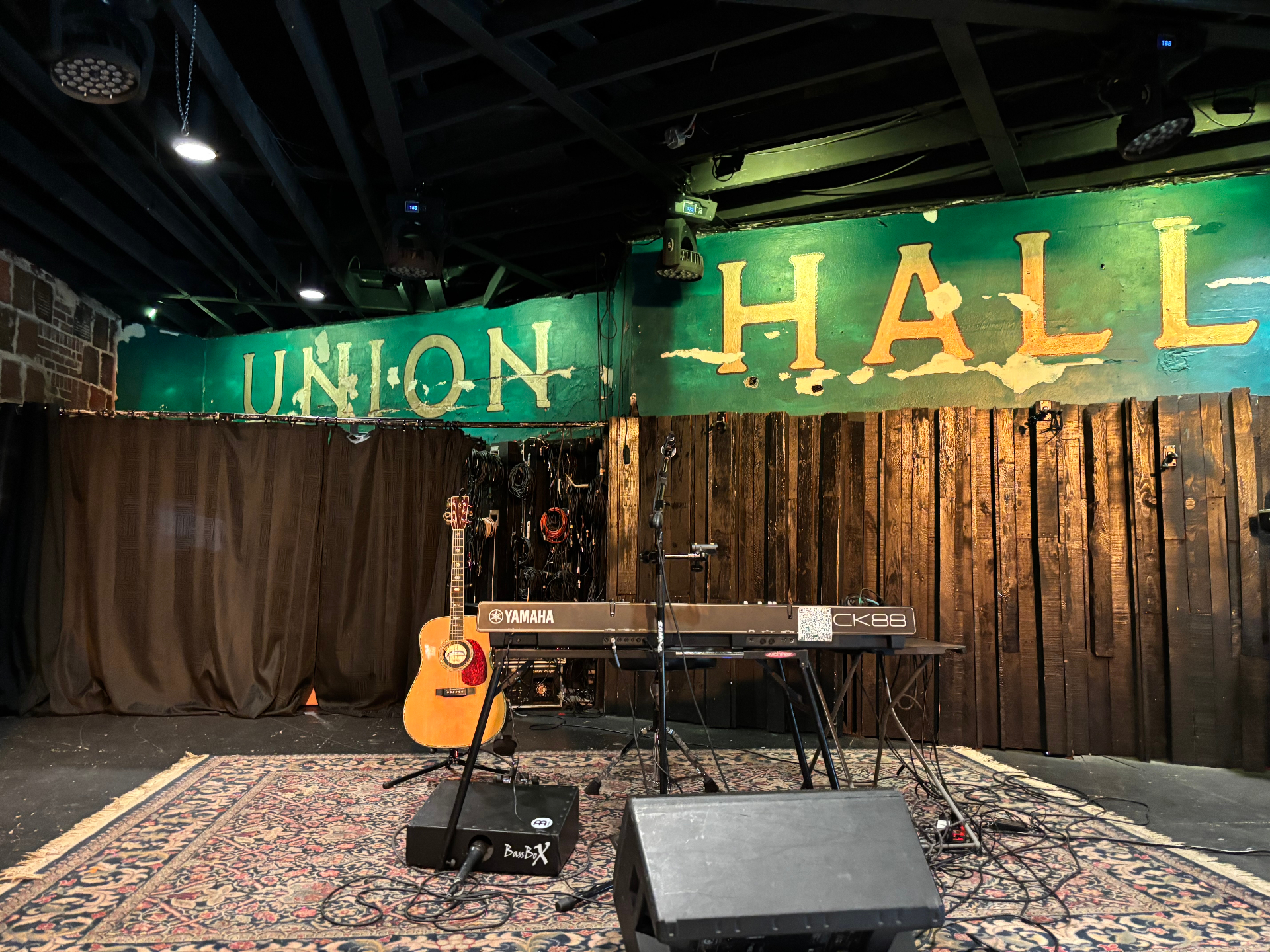 Union Hall stage set with keyboard and acoustic guitar